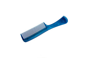 Plastic comb comb on a white background