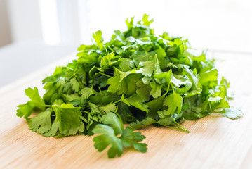Parsley (Petroselinum crispum) as a herb in the kitchen