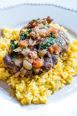 Osso Buco, Veal Shanks that are Braised in Wine with Milanese Saffron Risotto.