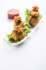 Crispy Potli Samosa or veg money bags are delicious Indian snacks of spiced aloo and mix veggies Or Meat/kheema  stuffed in flaky dough. It's a great creative starter or appetiser. served with ketchup