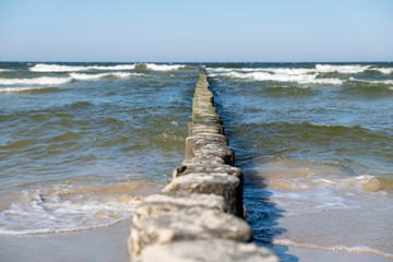 View to the Baltic Sea with its groynes at the beach of Zempin.