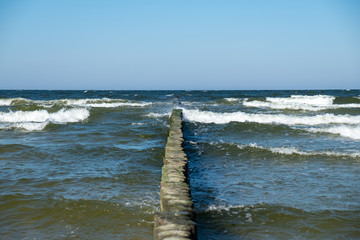 View to the Baltic Sea with its groynes at the beach of Zempin.