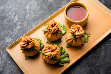 Crispy Potli Samosa or veg money bags are delicious Indian snacks of spiced aloo and mix veggies Or Meat/kheema  stuffed in flaky dough. It's a great creative starter or appetiser. served with ketchup