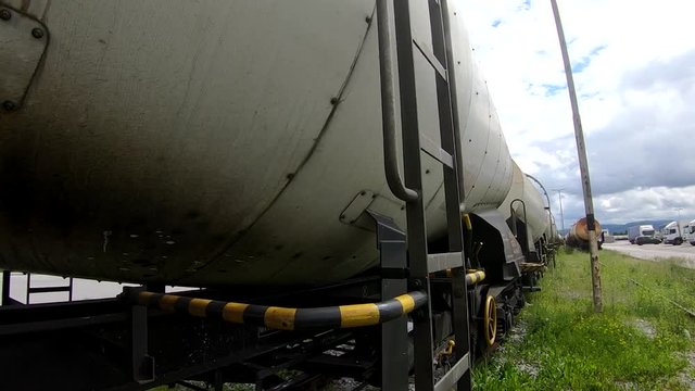 Wagons for liquids waits for further transportation on train depot