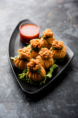 Crispy Potli Samosa or veg money bags are delicious Indian snacks of spiced aloo and mix veggies Or Meat/kheema  stuffed in flaky dough. It's a great creative starter or appetiser. served with ketchup
