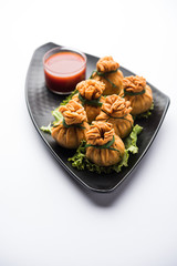 Crispy Potli Samosa or veg money bags are delicious Indian snacks of spiced aloo and mix veggies Or Meat/kheema  stuffed in flaky dough. It's a great creative starter or appetiser. served with ketchup