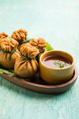 Crispy Potli Samosa or veg money bags are delicious Indian snacks of spiced aloo and mix veggies Or Meat/kheema  stuffed in flaky dough. It's a great creative starter or appetiser. served with ketchup