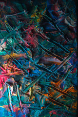 plasticine texture smeared and scratched in different colors on the board for modeling