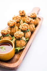 Crispy Potli Samosa or veg money bags are delicious Indian snacks of spiced aloo and mix veggies Or Meat/kheema  stuffed in flaky dough. It's a great creative starter or appetiser. served with ketchup