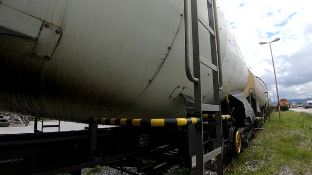 Wagons for liquids waits for further transportation on train depot