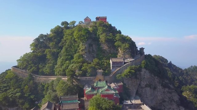 Aerial landscape to the golden peak on Tianzhu Peak, the main peak of Wudang Mountain, is the essence and symbol of Wudang Mountain. A prosperity symbol of Wudang Taoism. Wudangshan, Hubei, China.