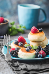 Cottage cheese pancakes with berries. Healthy Breakfast.