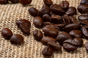 Coffee Beans Arabica Canvas Background. Close-up photo.