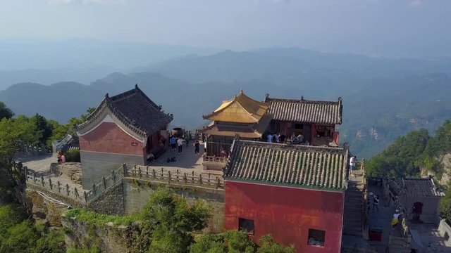Great panorama to Golden Palace and Wudangshan mountains. Place is made of pure copper and inlaid with gold. It is called the "Pilgrimage Palace". Tianzhu Peak in Wudangshan Mountains, Hubei province,