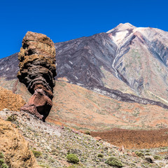 Fototapeta na wymiar Stone finger on the background of the volcano