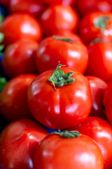 Red ripe tomatoes on farmets market close up