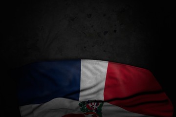 nice dark illustration of Dominican Republic flag with large folds on black stone with empty space for your content - any holiday flag 3d illustration..