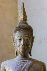 Lan Chang Buddha statue art in various temples in Luang Prabang, Laos.