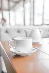 Fototapeta na wymiar cup of tea at a cafe blurred background