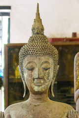 Lan Chang Buddha statue art in various temples in Luang Prabang, Laos.