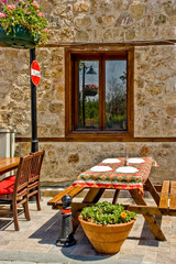 outdoor cafe near the house of old bricks