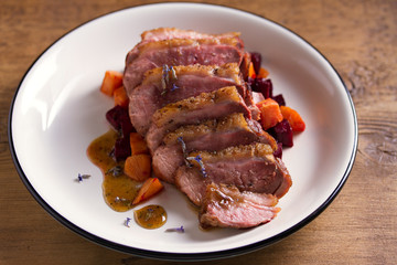Duck breast with lavender, beetroot, sweet potato and maple syrup