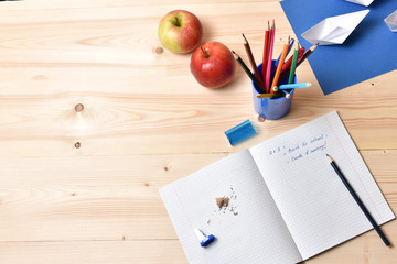 School accessories on a wooden table. Concept Back to school.