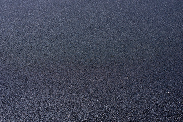 Close up of fresh new asphalt pavement