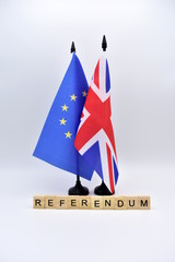 The Brexit and the flags of the United Kingdom and the European Union.