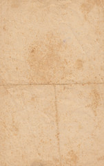 Fototapeta premium Texture old paper with traces of scuffs and stains.