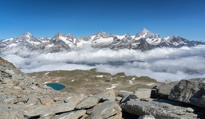 morning clouds over the Valley of Zermatt, view from Gornergrat to the north with Weisshorn, Zianlrothorn and Obergabelhorn