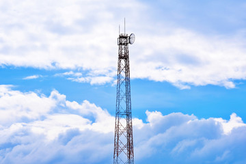 Obraz premium Telecommunications tower with cloudy sky