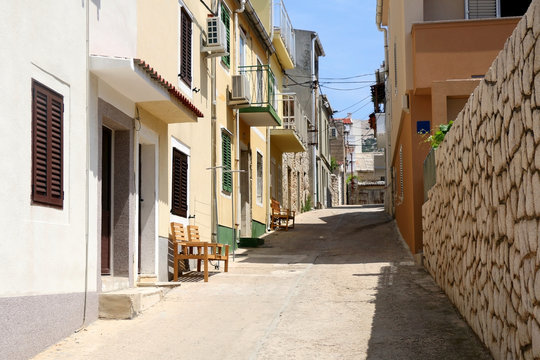 Fototapeta Picturesque narrow streets of town Pag, on island Pag, Croatia.