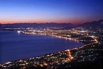 Fototapeta na wymiar KALAMATA, GREECE. Panoramic night view of the capital of Messinia Prefecture, Peloponnese.