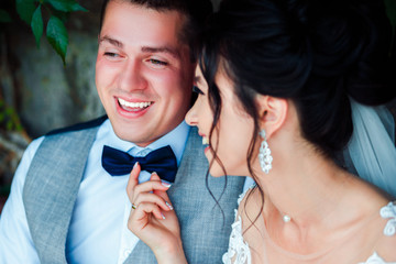 The guy and the girl are smiling at each other.