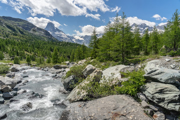 landscape in the Zermatt area with Findel Creek in the foreground and famous mount Matterhorn in...