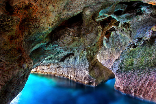 Sea cave at Marmara (also known as "Dialeskari") beach, close to Loutro village, Sfakia region, Chania prefecture, Crete, Greece.