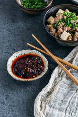 Stone Bowls with Condiments