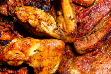 Assorted delicious grilled meat on a barbecue
