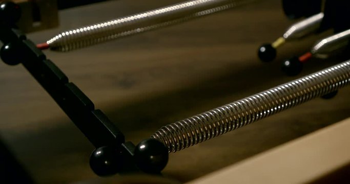 Closeup of female hands sports girl, she does Pilates, doing exercises with your hands using the exerciser with springs.