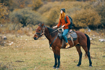 woman riding horse