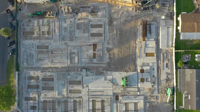 Aerial shot above a construction site with crane