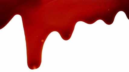 Blood dripping down from the top. White background, blood foreground, horror.