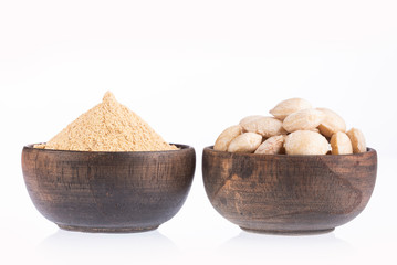 Seeds and powder of Sacha Inchi - Plukenetia volubilis. Text space