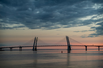 Fototapeta na wymiar Suspencion bridge at sunset
