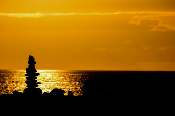 Stack of stones on the sea beach