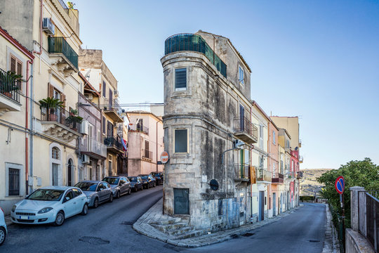 Narrow house at a curve, Ragusa, Sicily, Italy