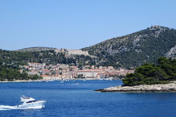 A faraway view from the ferry of the town of Hvar, on Hvar Island, Croatia.  It is a beautiful...
