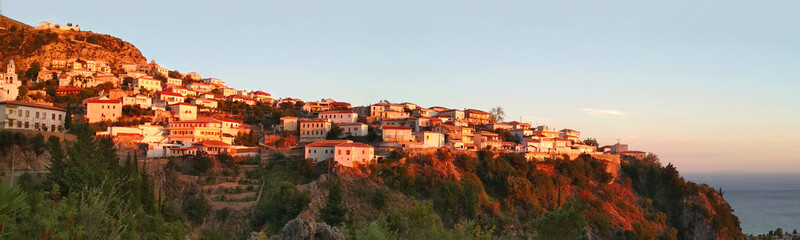 Fototapeta na wymiar Panoramic view of Dhermi village in the summer evening, Albania