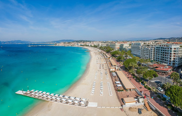 Panorama of Cannes, Cote d'Azur, France, South Europe. Nice city and luxury resort of French riviera. Famous tourist destination with nice beach and Promenade de la Croisette on Mediterranean sea - obrazy, fototapety, plakaty